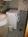 interior of rent apartment dubrovnik bathroom detail washer
